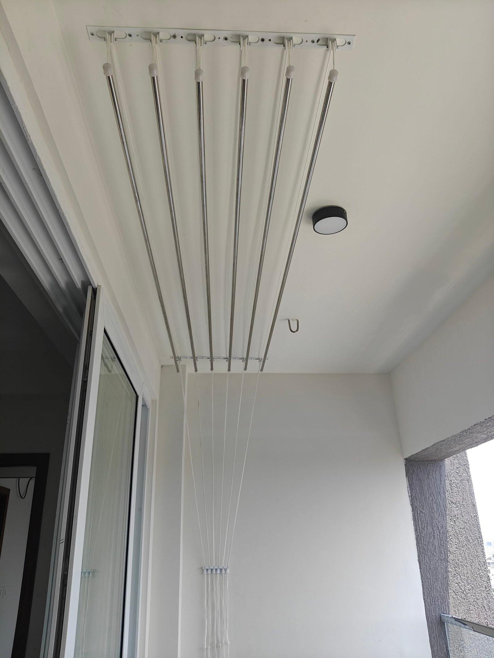 Ceiling Cloth Hangers in Chennai installed in apartment balcony